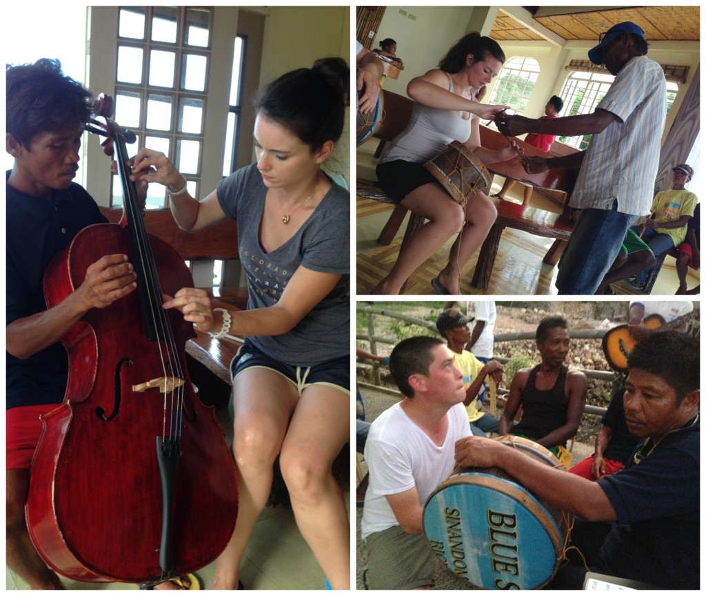 Participants have fun trying to play on each others' musical instruments for the first time