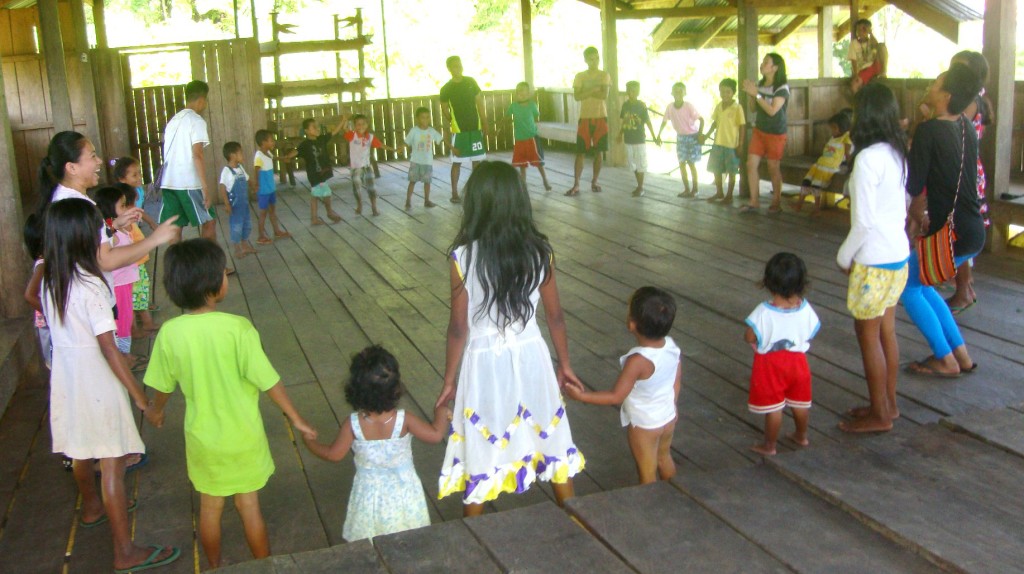 Higaonon young learners enjoy freely moving around their tribal house as part of the workshop facilitated by Cartwheel Team members