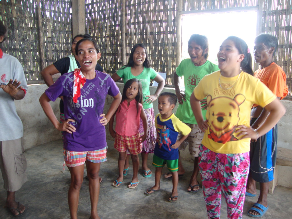 Community members from Sitio Cagait enjoy the Duyanan chant as they create action and sounds together