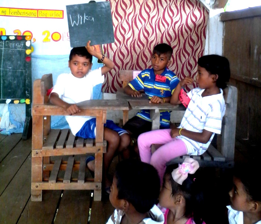Higaonon representative learners participate in a Filipino Quiz Bee in a neighboring sitio