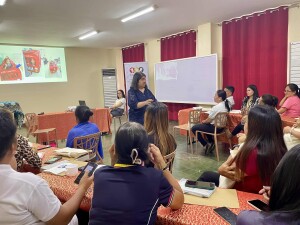 Teacher Kaycee as she discusses child developmental milestones 