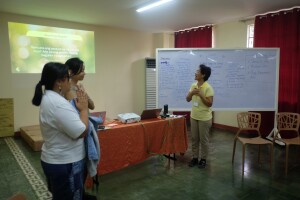 Gen and Z, both from Pilipinas Journal, as they were listening to Teacher Marilyn (one of the participants) sharing her key takeaways during their learning session 